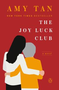 The cover of The Joy Luck Club, featuring a younger woman with her arm around an older woman.